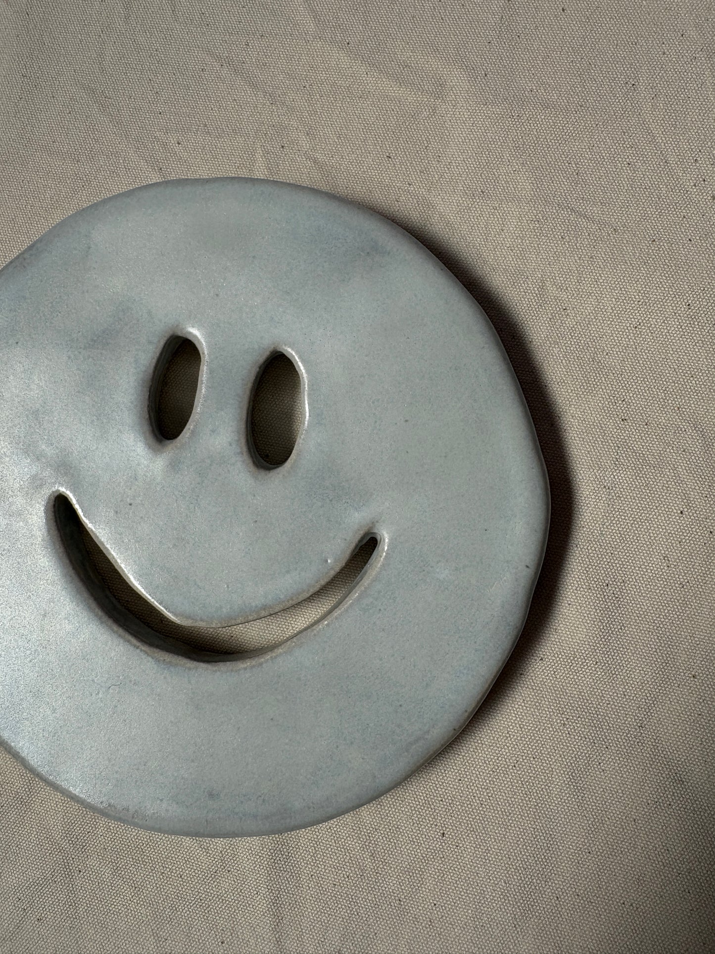 SALE Smiley onderzetter wit