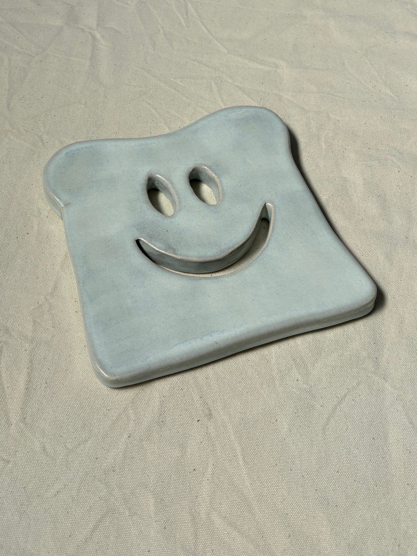 SALE Toast onderzetter wit